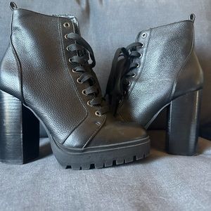 Steven Madden black high heeled boots